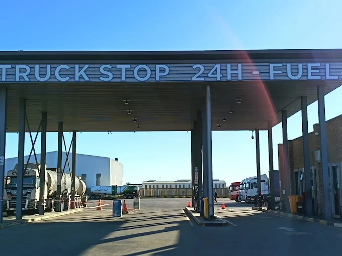 JC Truckstop 24-hour fuel forecourt in Sasolburg, Vaal Triangle — trucks refuelling under the canopy